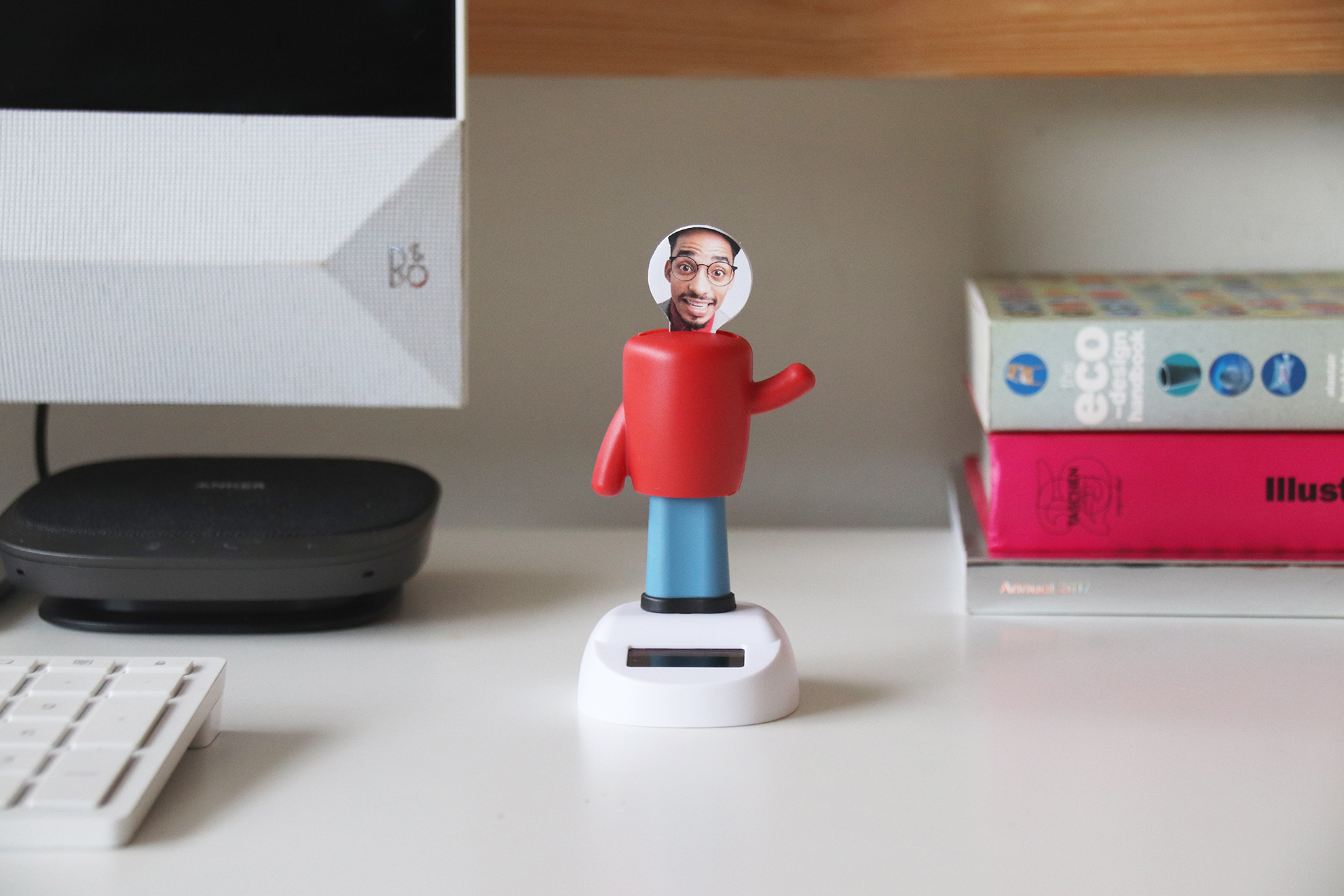 Person Figurine on Desk