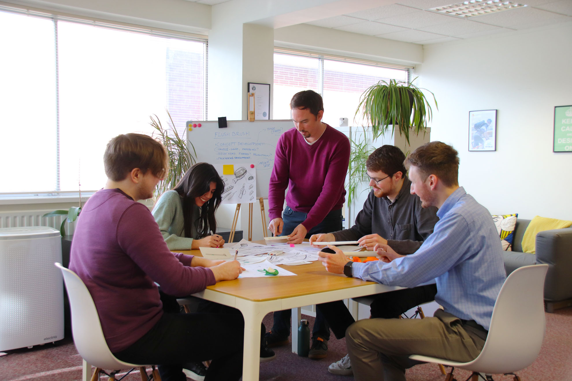 Product Design consultancy team sketching and brainstorming product ideas
